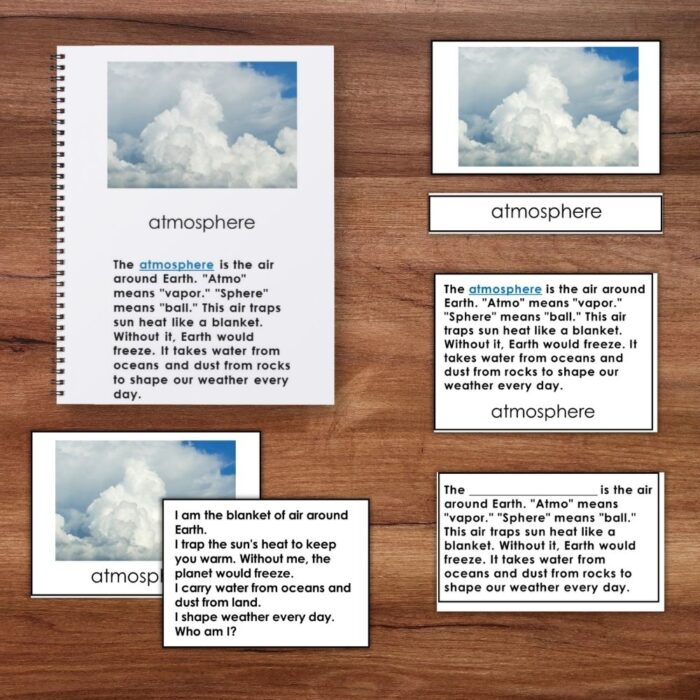 A set of printed materials titled "Earth's Climate System" rests on a wooden surface, each featuring cloud imagery and text about the atmosphere, its definition, and its essential impact on Earth's climate and weather. Montessori Nature Printables
