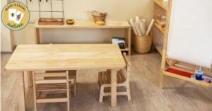A playroom with some of the best Montessori tools and materials for teachers and parents, including a wooden table and chairs.