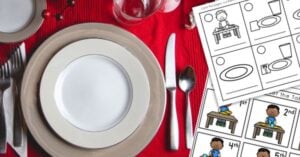 A formal table setting with a white plate, silverware, and a red placemat sits beside black-and-white printables featuring practical life activities like how to set the table. Montessori Nature Printables