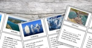 Flashcards with images and definitions of geographical features—such as iceberg, glacier, valley, and bay—highlighting key coastal features and inland features, displayed on a wooden surface for engaging science activities. Montessori Nature Printables