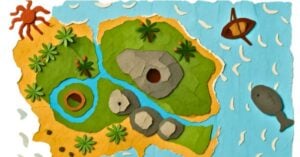 A colorful paper-cut style map brings Imaginary Island Study to life, showing rocks, trees, rivers, a crab, a boat in the water, and a fish or seal near the shore—perfect for hands on geography exploration. Montessori Nature Printables