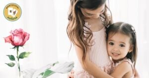 two sisters hugging